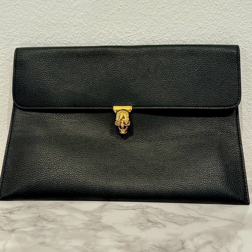Alexander McQueen Black Envelope Clutch with gold skull.